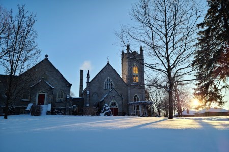 Sun shining on Church in winter