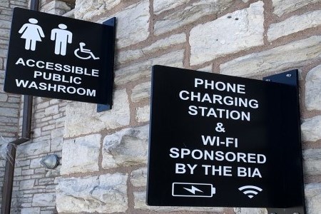 Public washroom signage on building