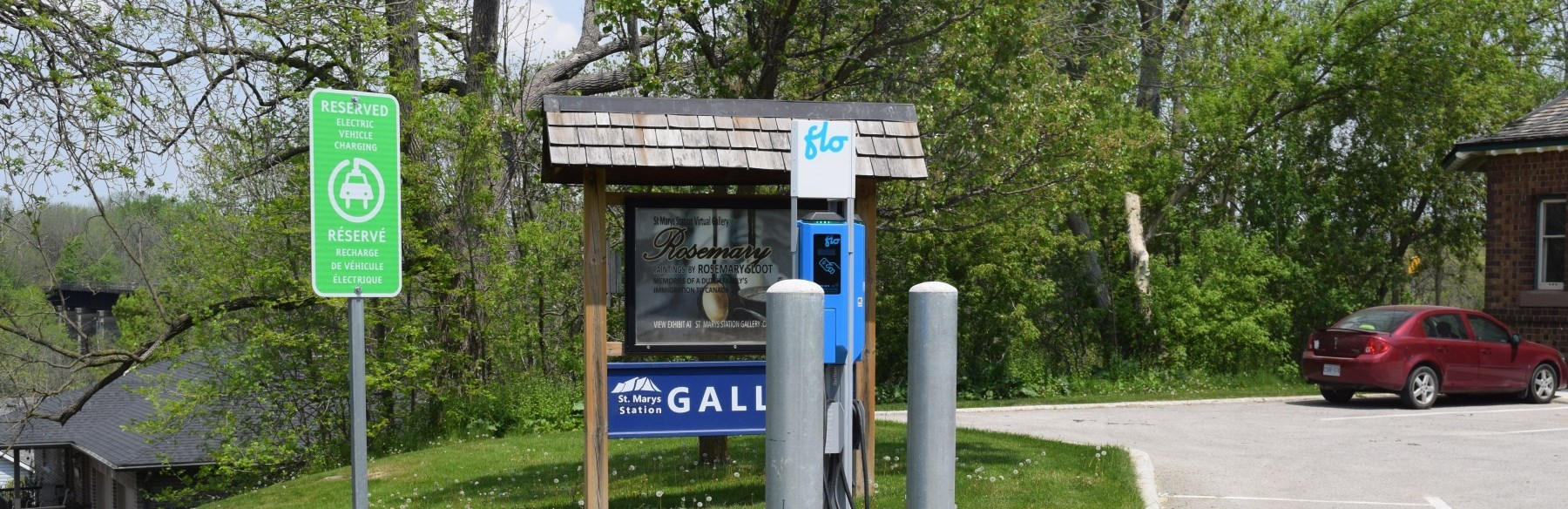 Electric car charger in parking lot