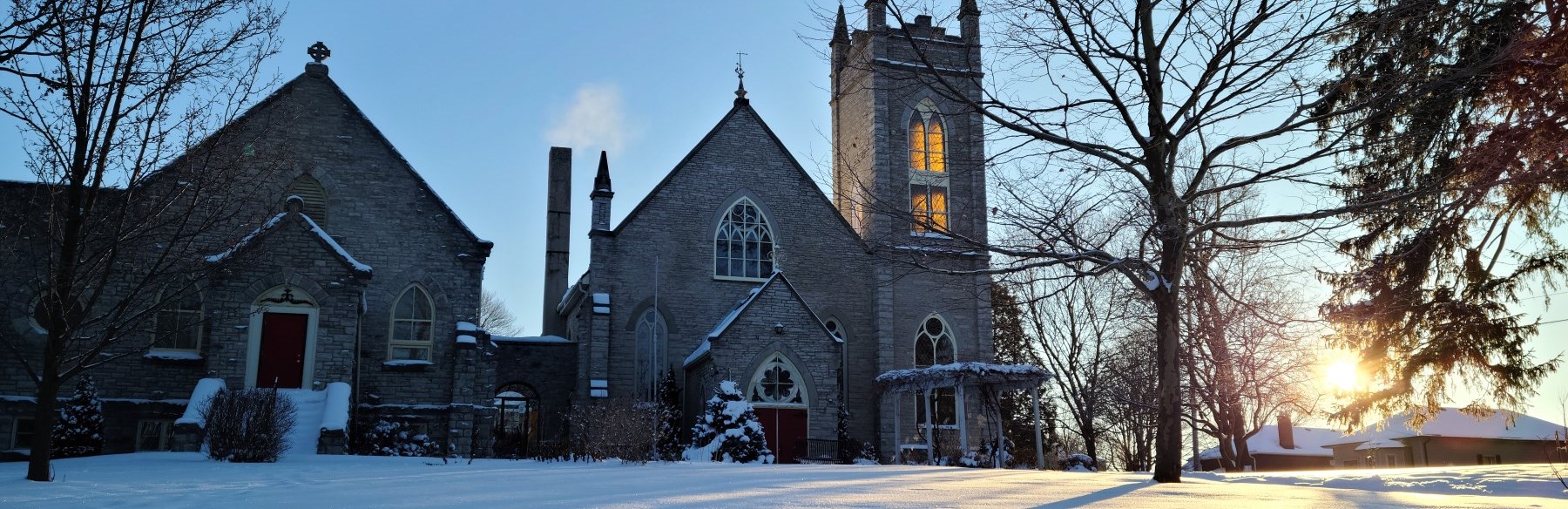 Sun shining on Church in winter