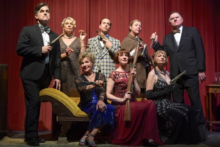 Community Players cast posing on set 