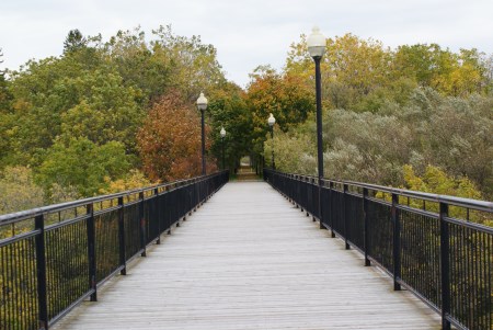 Trail path over bridge in autumn