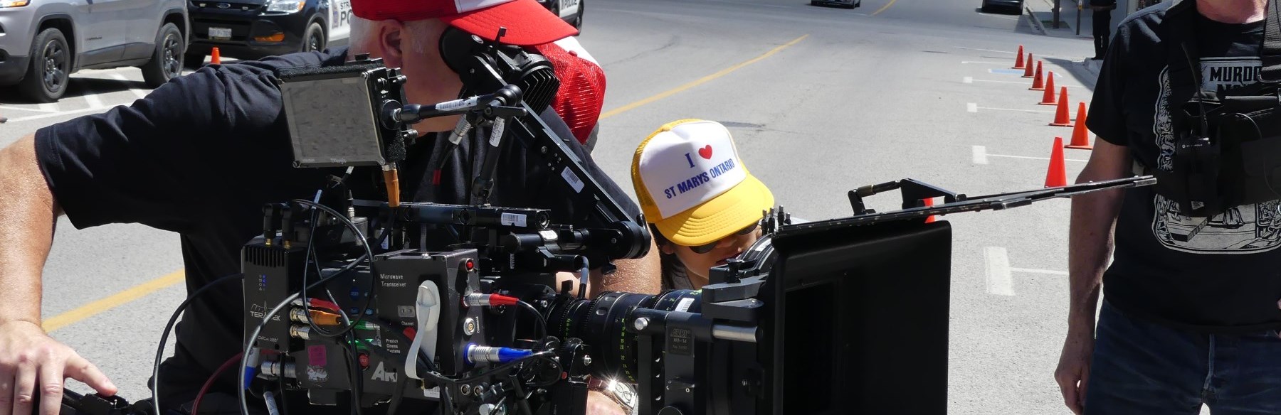 Cameramen filming on set