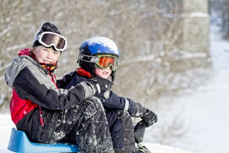 Children sledding in winter