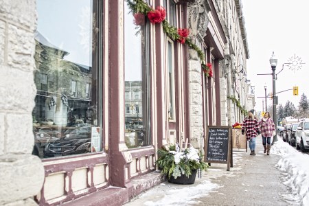 Street of outside shops Downtown St. Marys with shoppers