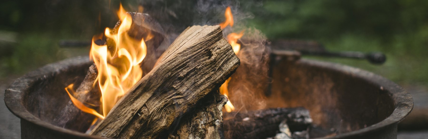 Wood burning on campfire