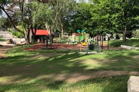 Playground equipment and park greenspace 