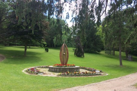 Statue on greenspace at park